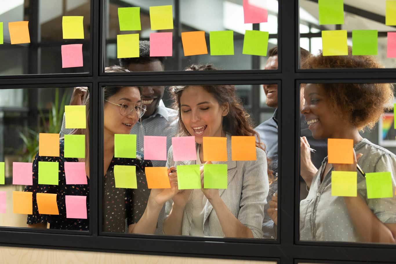 Colleagues having a stand-up meeting